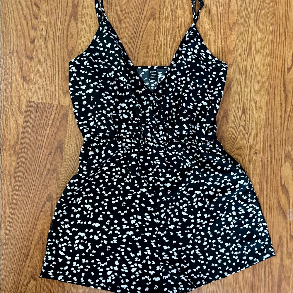 Shorts jumpsuit Black/ White w/red accent. Spaghetti straps. Light and airy M